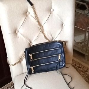 Rebecca Minkoff Black Leather Crossbody 3 zippers like new inside great conditio